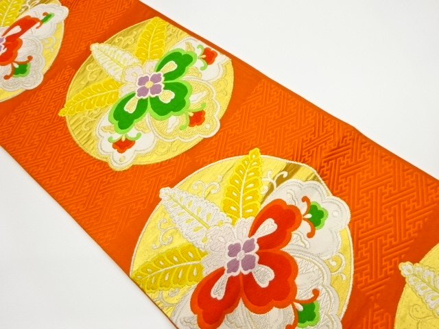 紗綾形に変わり華紋模様織出し袋帯